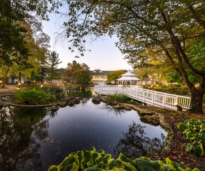 Cherry Valley outdoor garden with white gazebo and pond