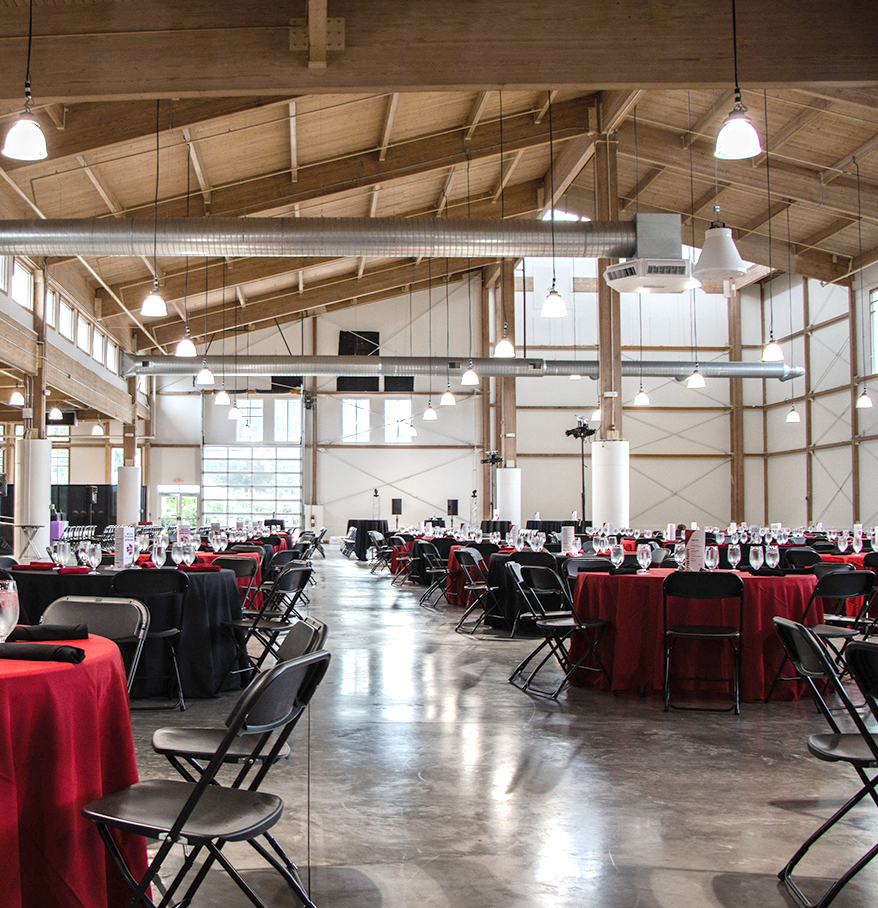 a room with tables and chairs