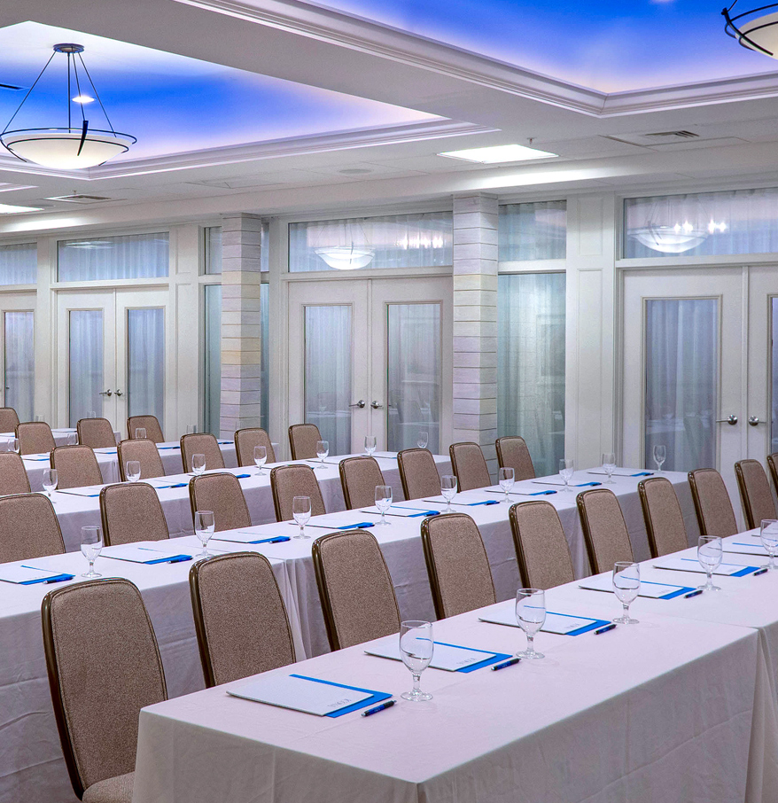 a room with tables and chairs