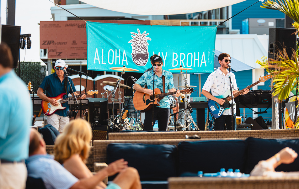 a group of people playing instruments on a stage