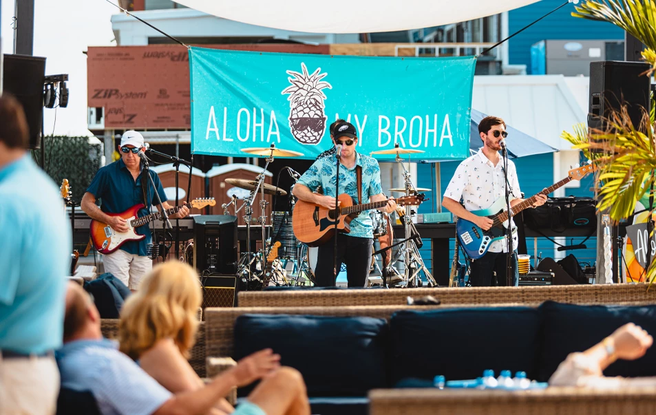 a group of people playing instruments on a stage