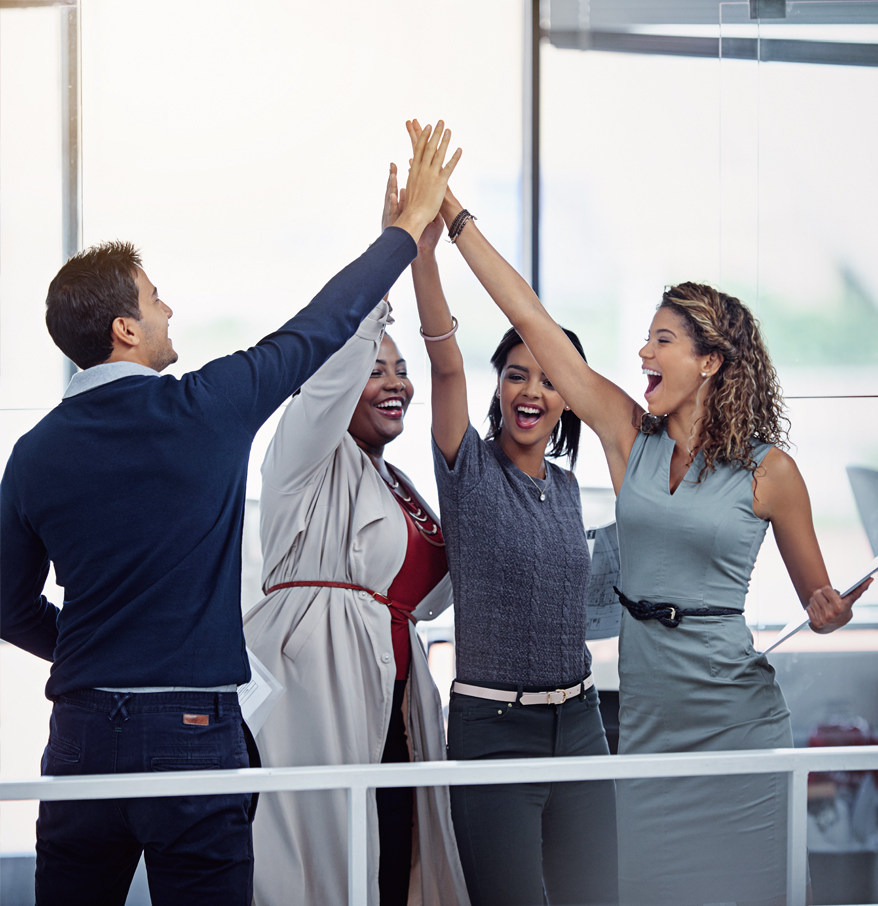 a group of people giving each other a high five