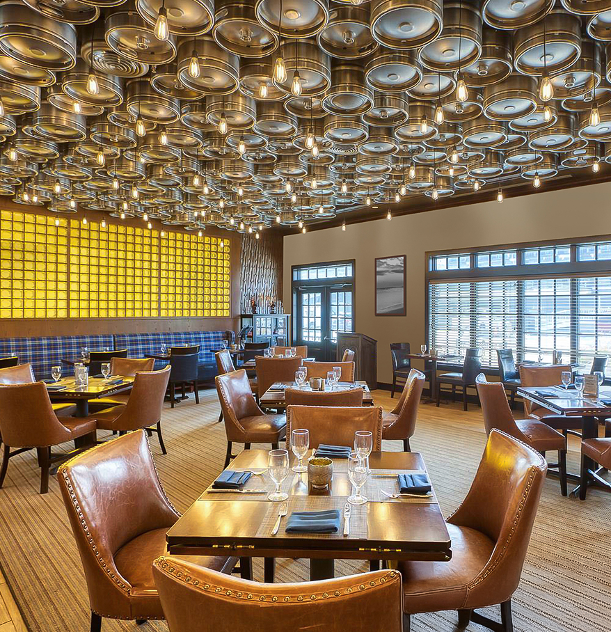 a room with tables and chairs