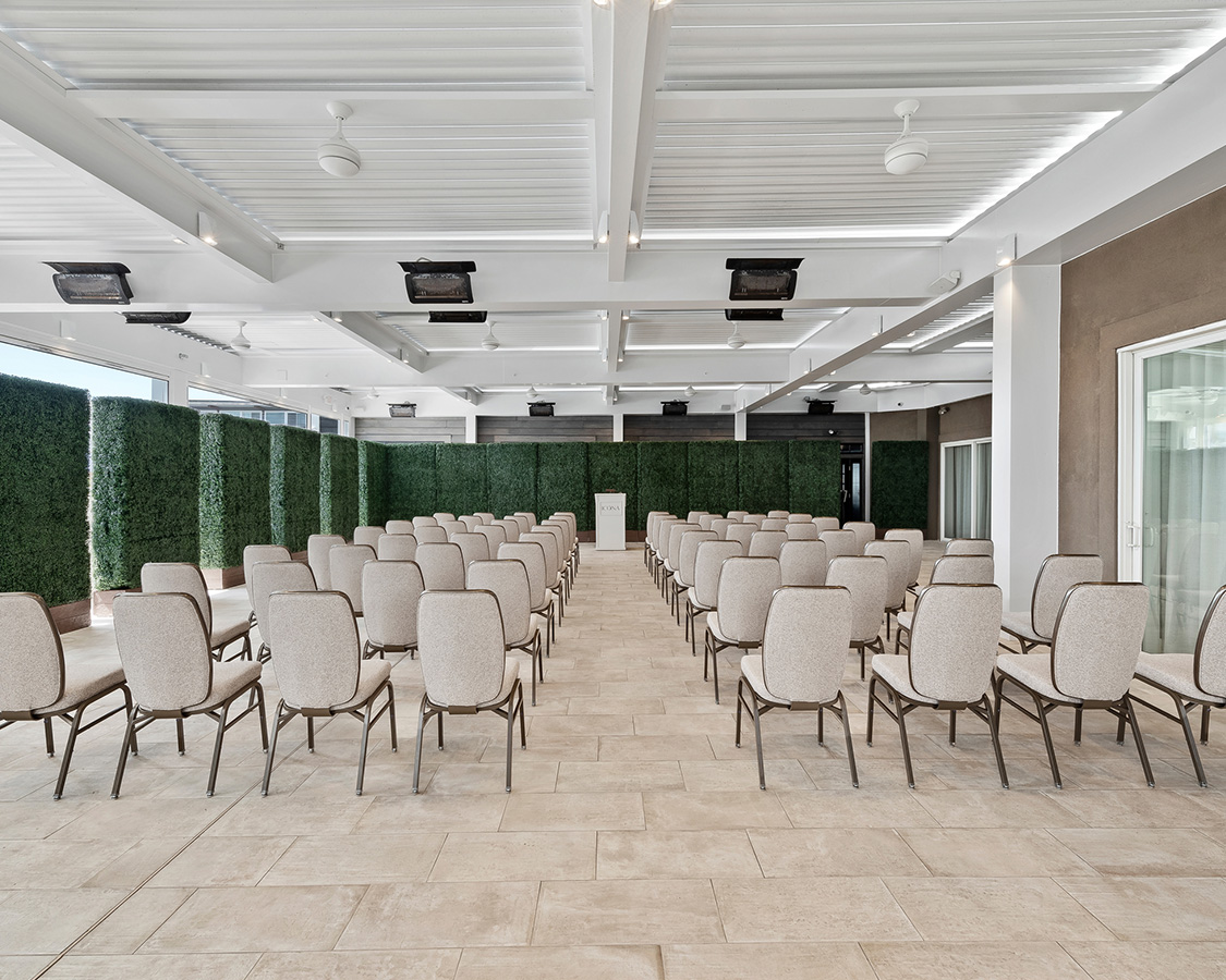 a room with rows of chairs