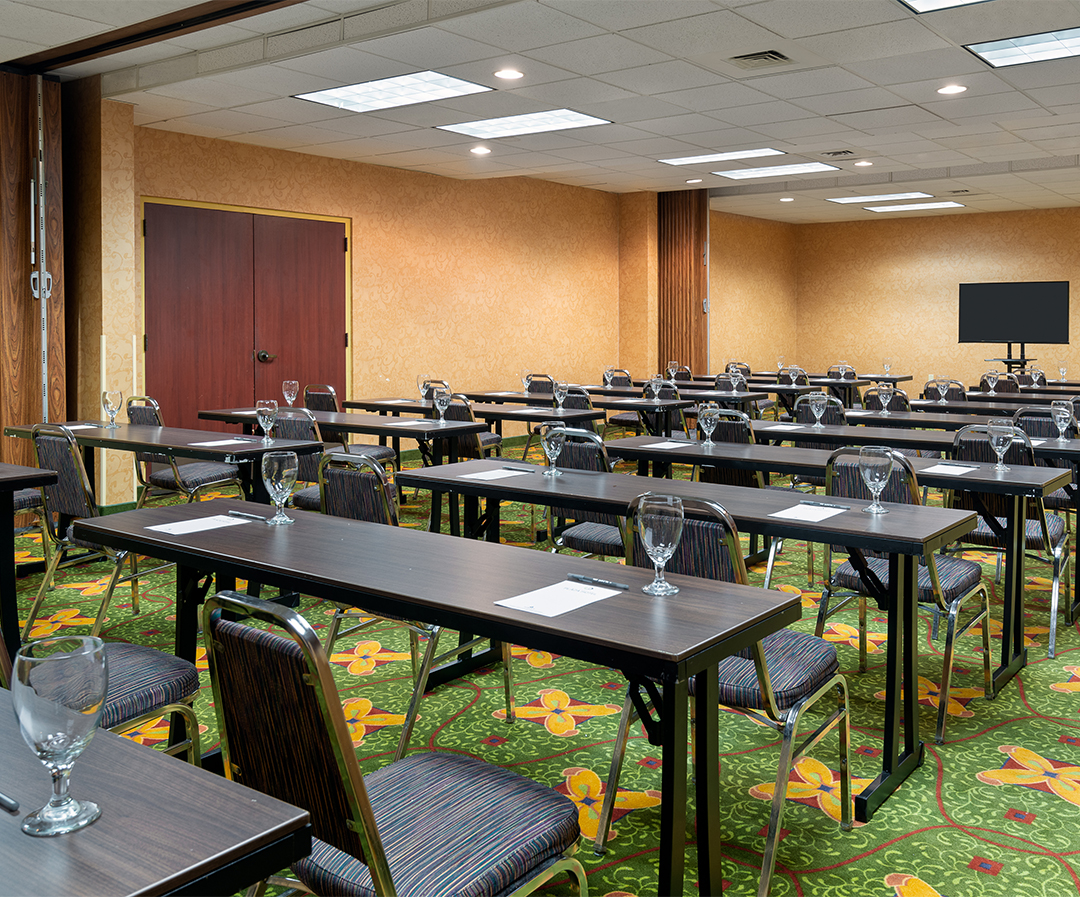 a room with tables and chairs