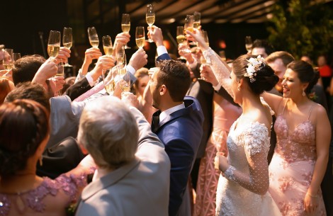 a group of people holding champagne glasses
