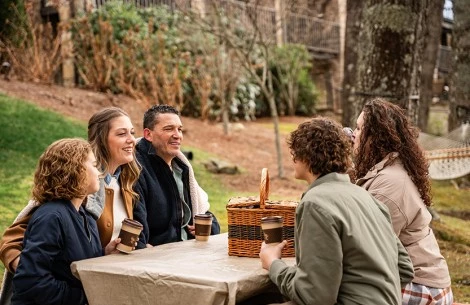 a group of people sitting at a table