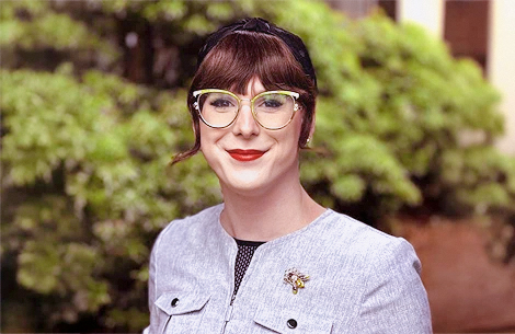 a woman smiling at camera