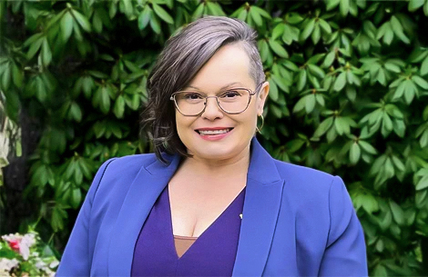 a woman in a blue suit