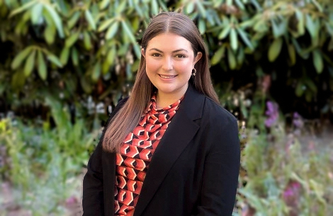 a woman smiling at camera