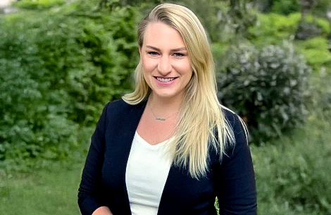a woman smiling at camera