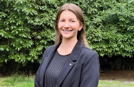 a woman smiling at camera