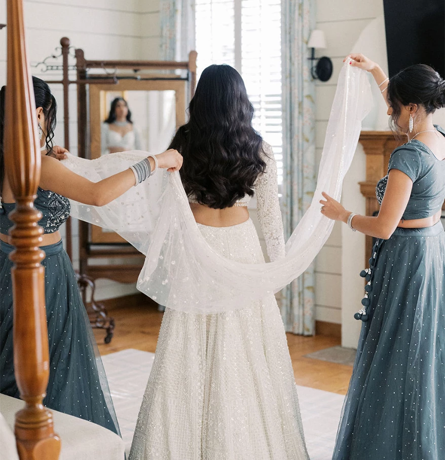 a group of women in dresses