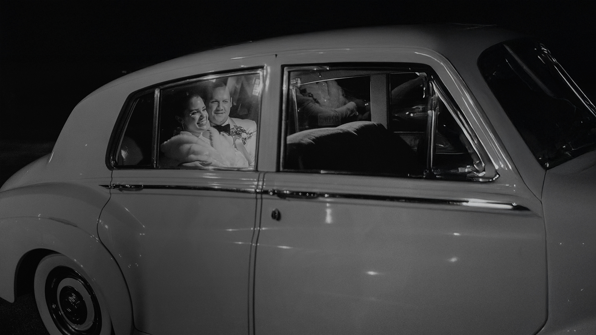 a man and woman in a car