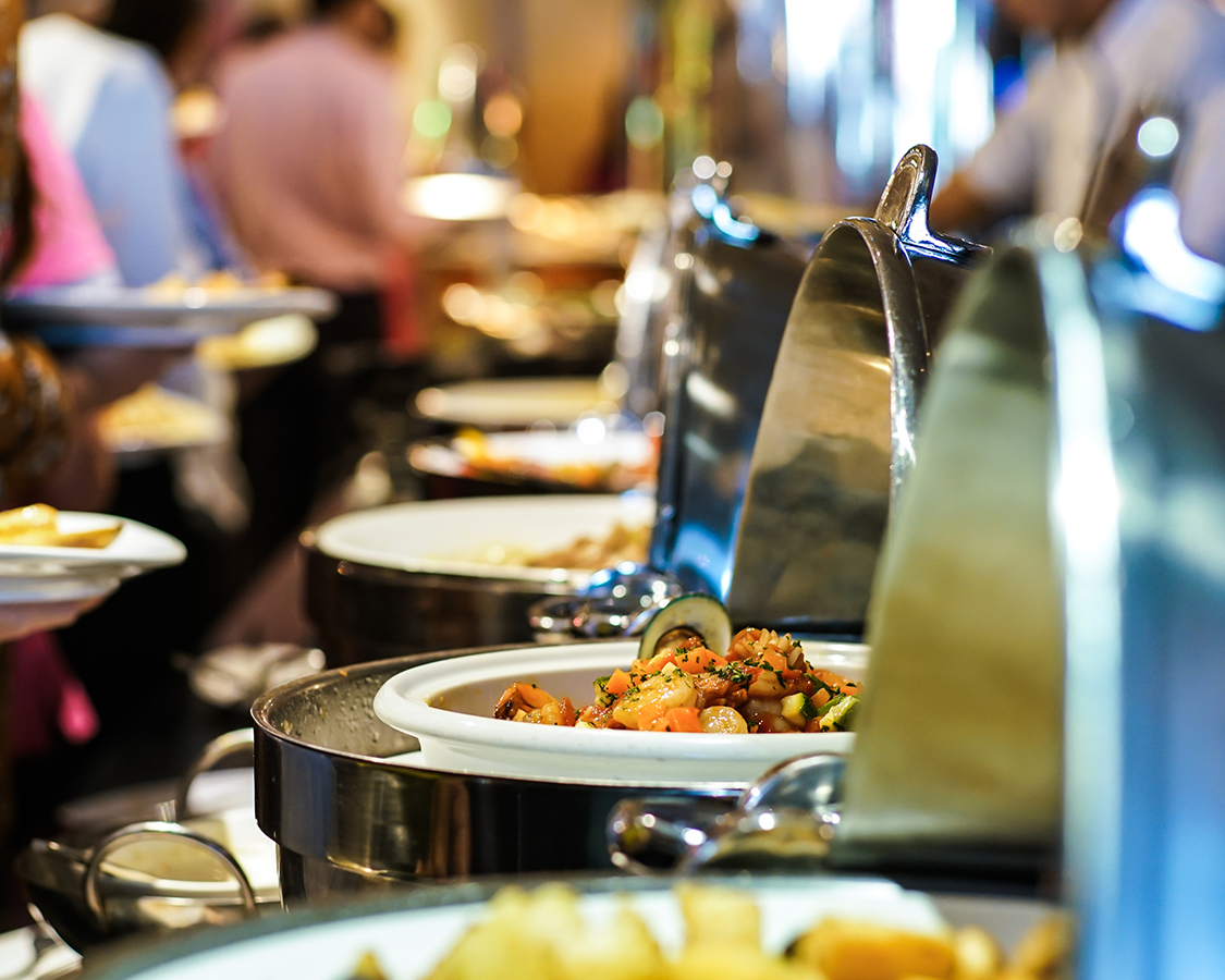 a row of bowls of food