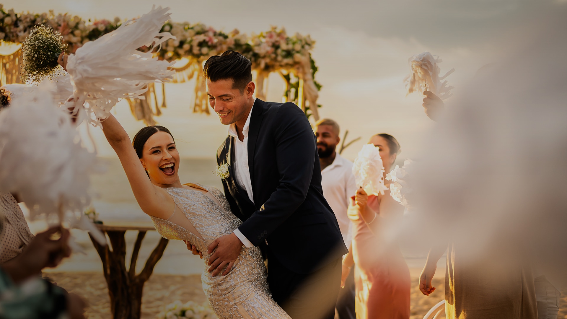 a man holding a woman in a dress