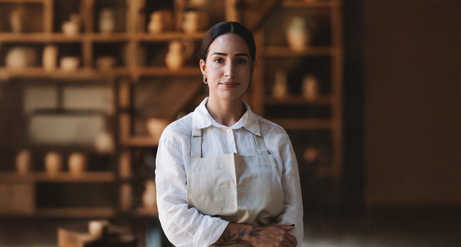 a woman in a white apron