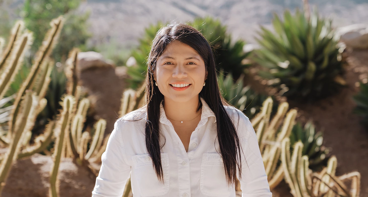 a woman smiling at camera