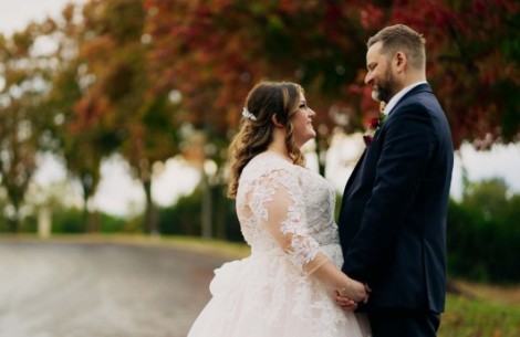 a man and woman holding hands