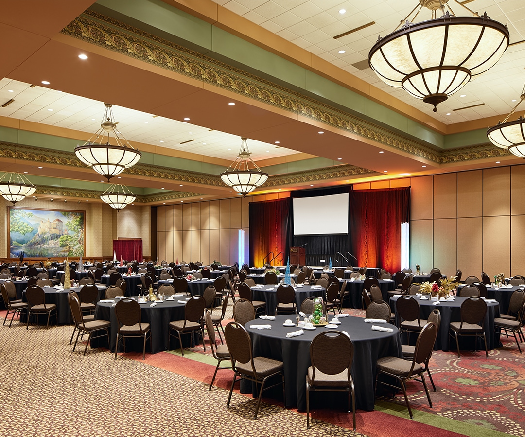 a large room with tables and chairs