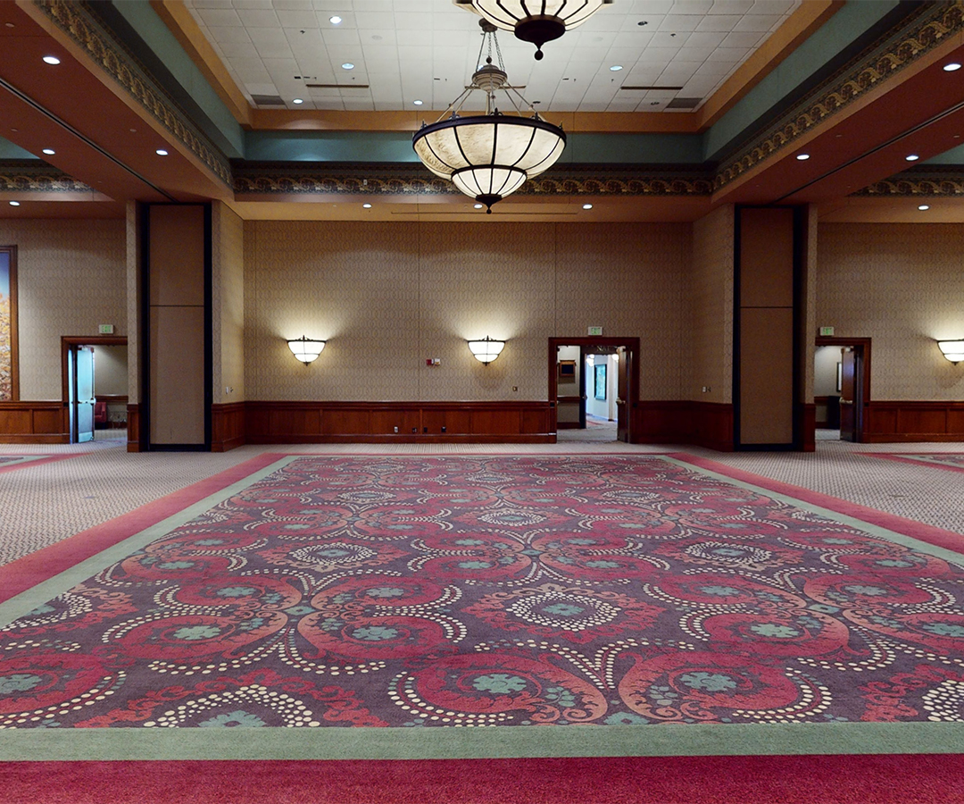 a large room with a large carpeted floor