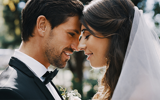 a man and woman looking at each other