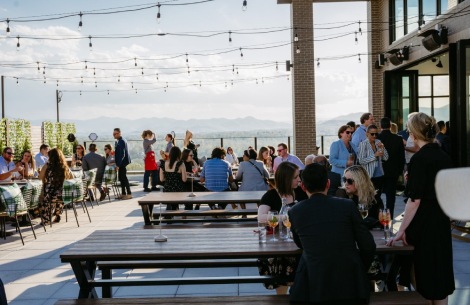 a group of people sitting at tables