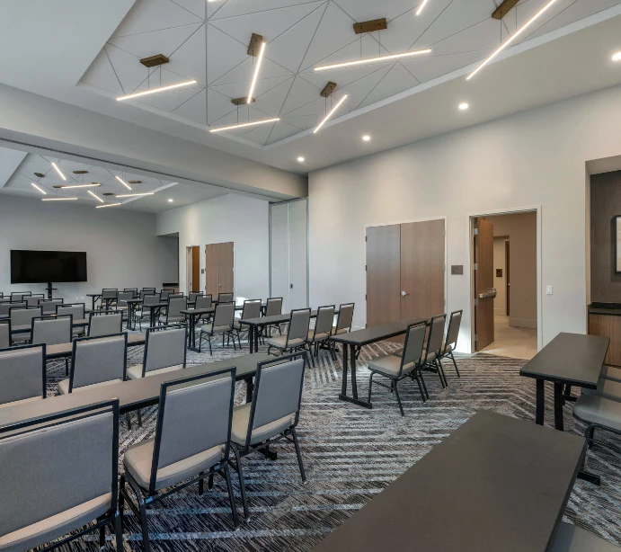a room with tables and chairs