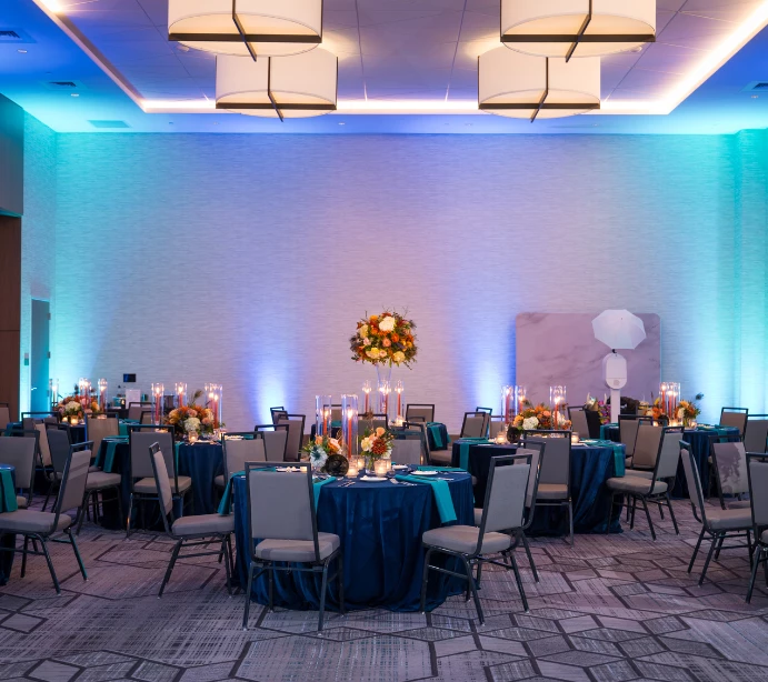 a room with tables and chairs