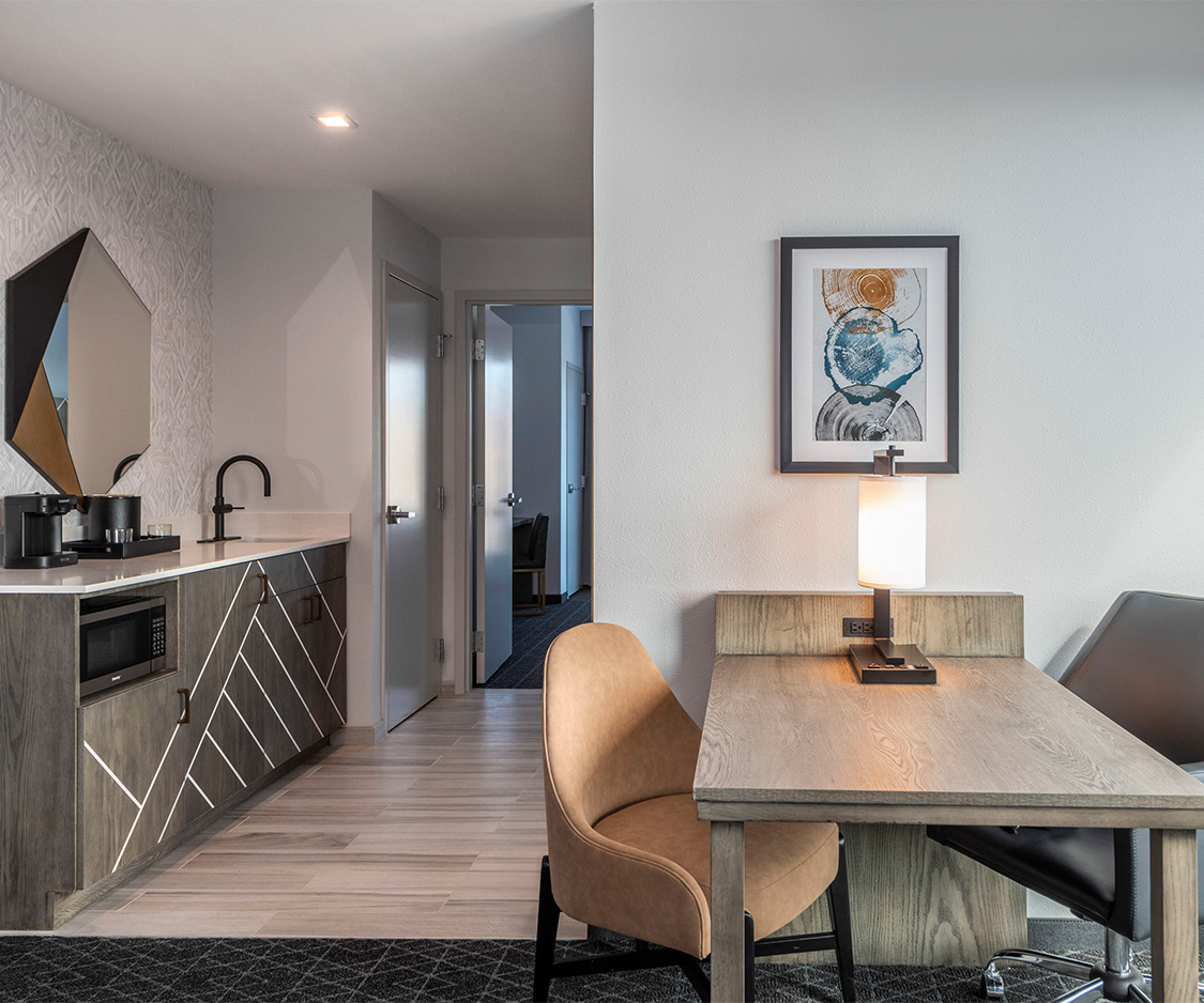 a room with a desk and chair