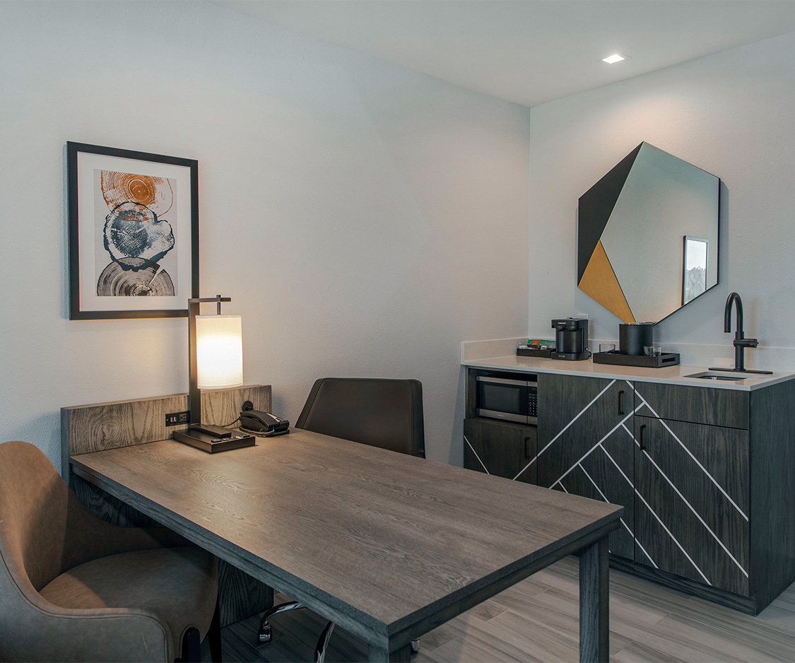 a room with a table and chairs