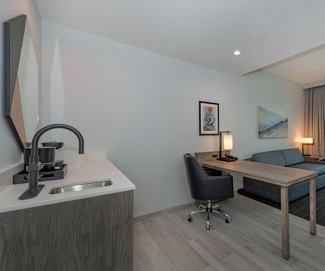 a room with a table and a couch