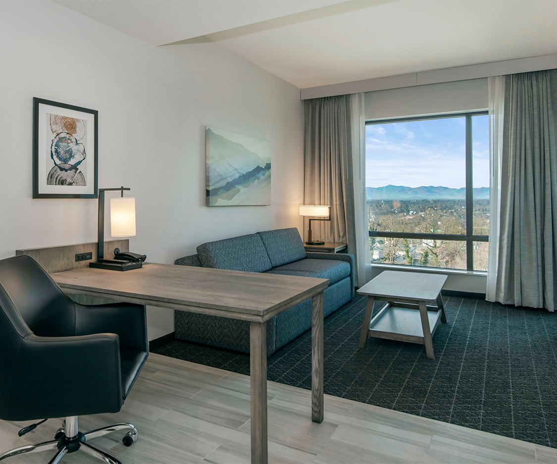 a room with a couch and a table