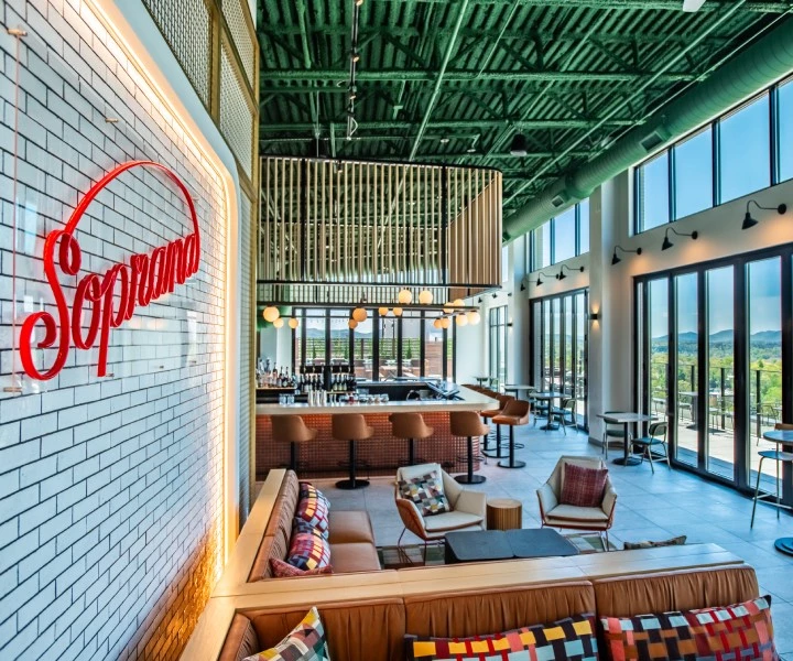 a room with a bar and a sign