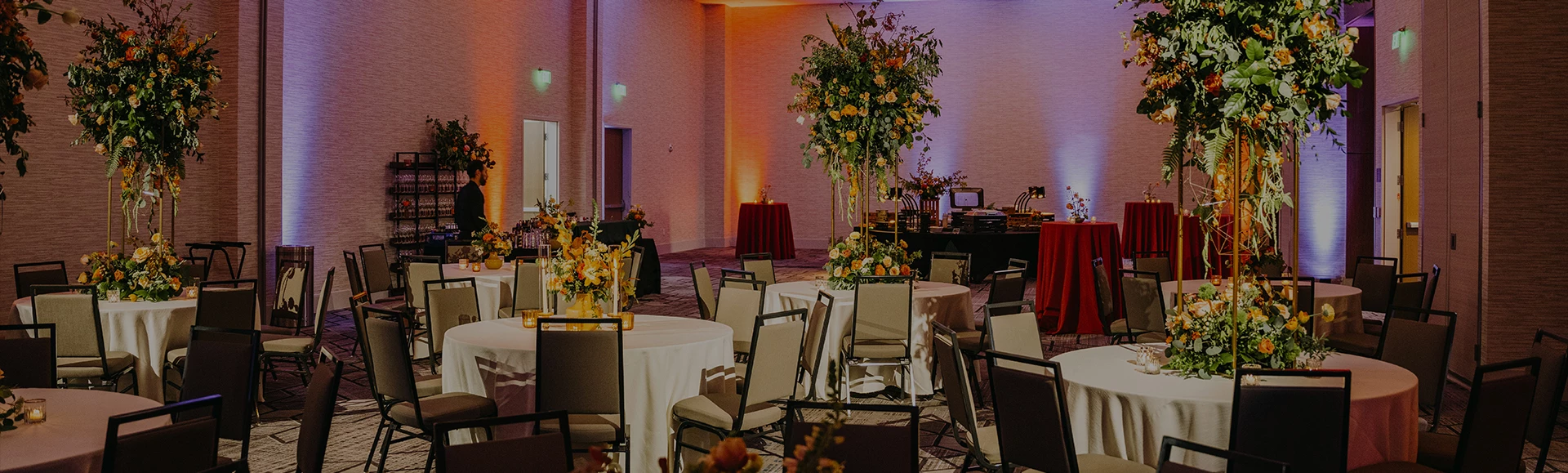 a room with tables and chairs