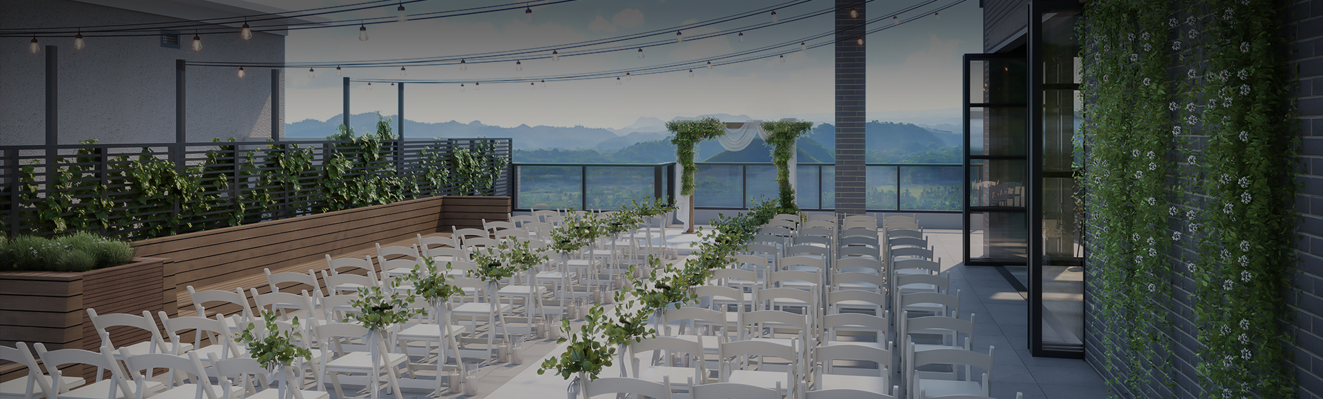 a wedding set up with chairs and a view of mountains