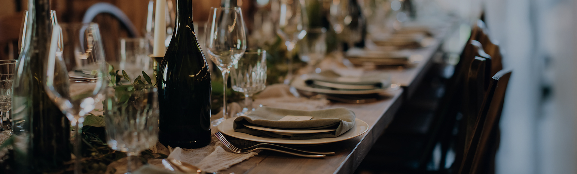 a table with plates and glasses