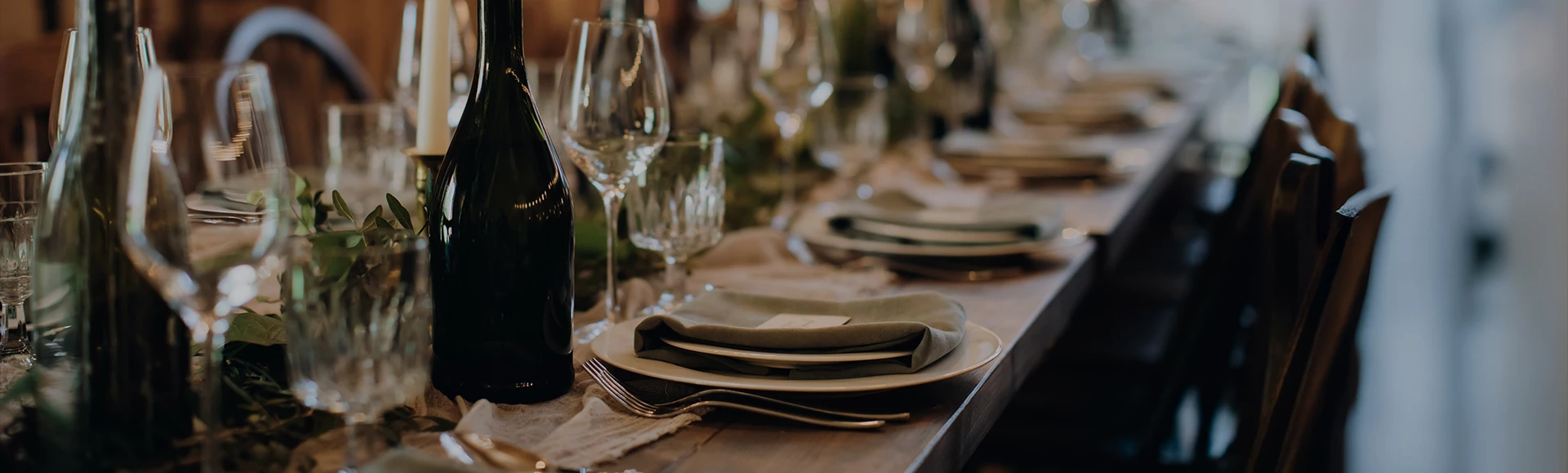a table with plates and glasses