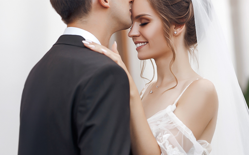 a man and woman kissing