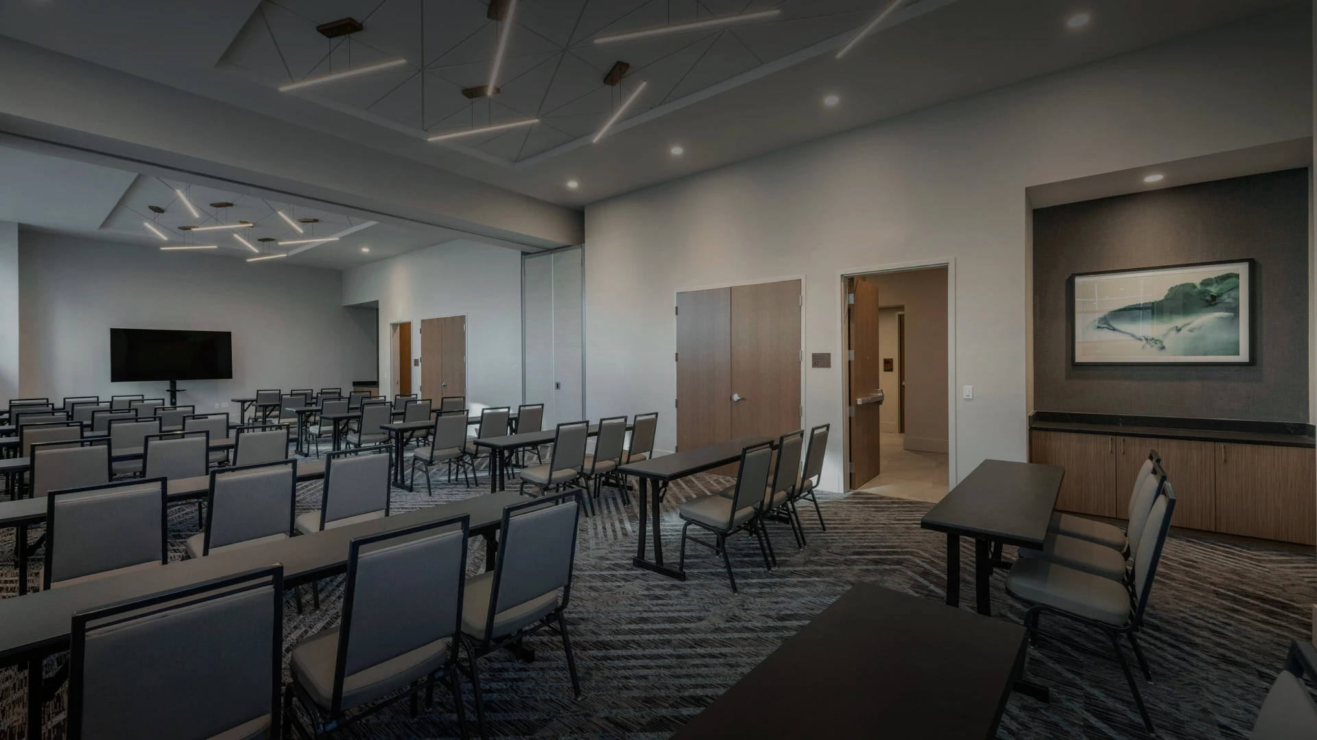 a room with tables and chairs