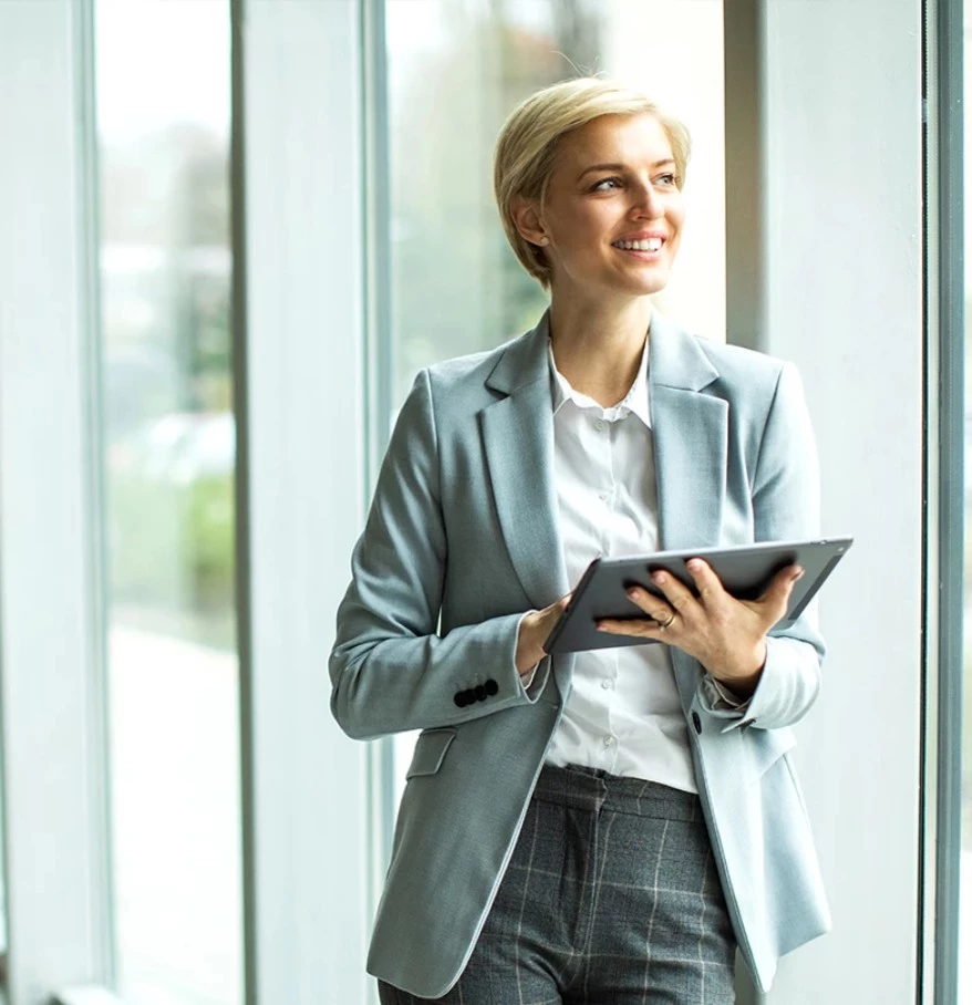 a woman holding a tablet