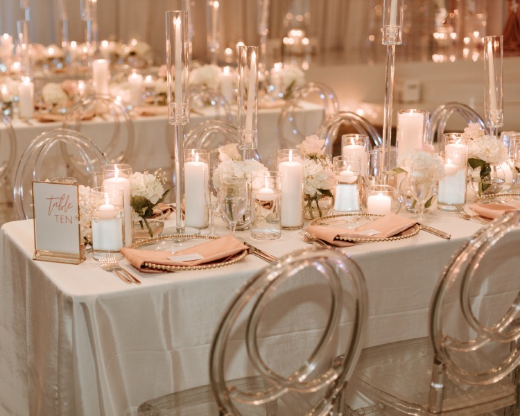 a table set with candles and flowers