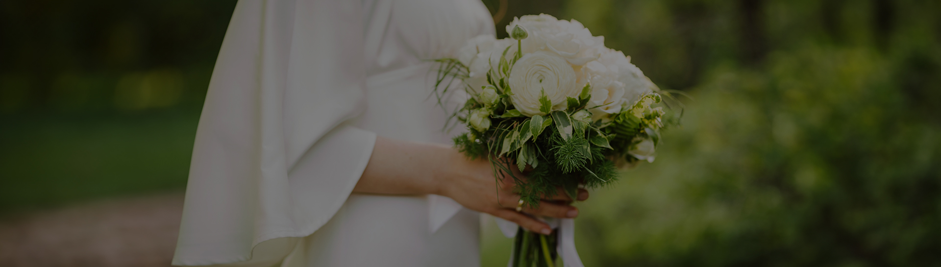 a person holding a bouquet of flowers