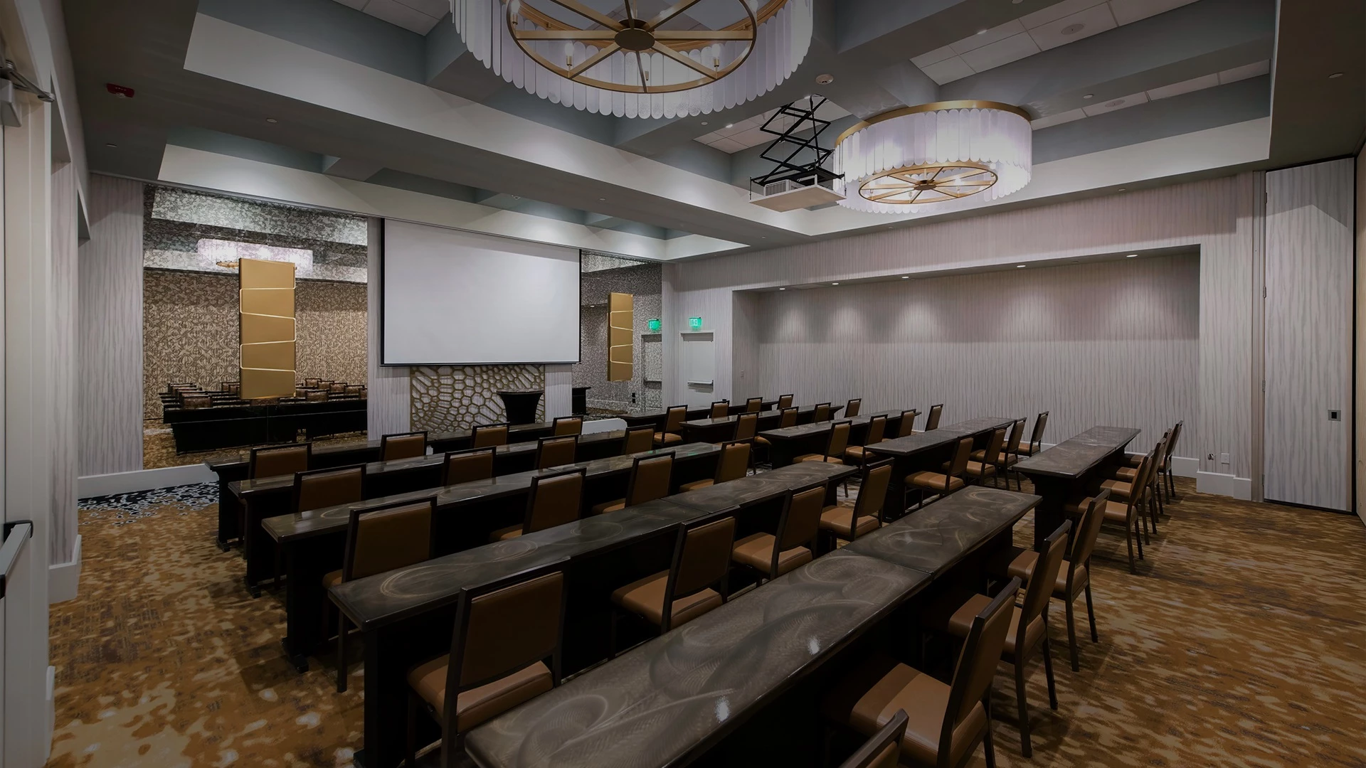 a conference room with tables and chairs