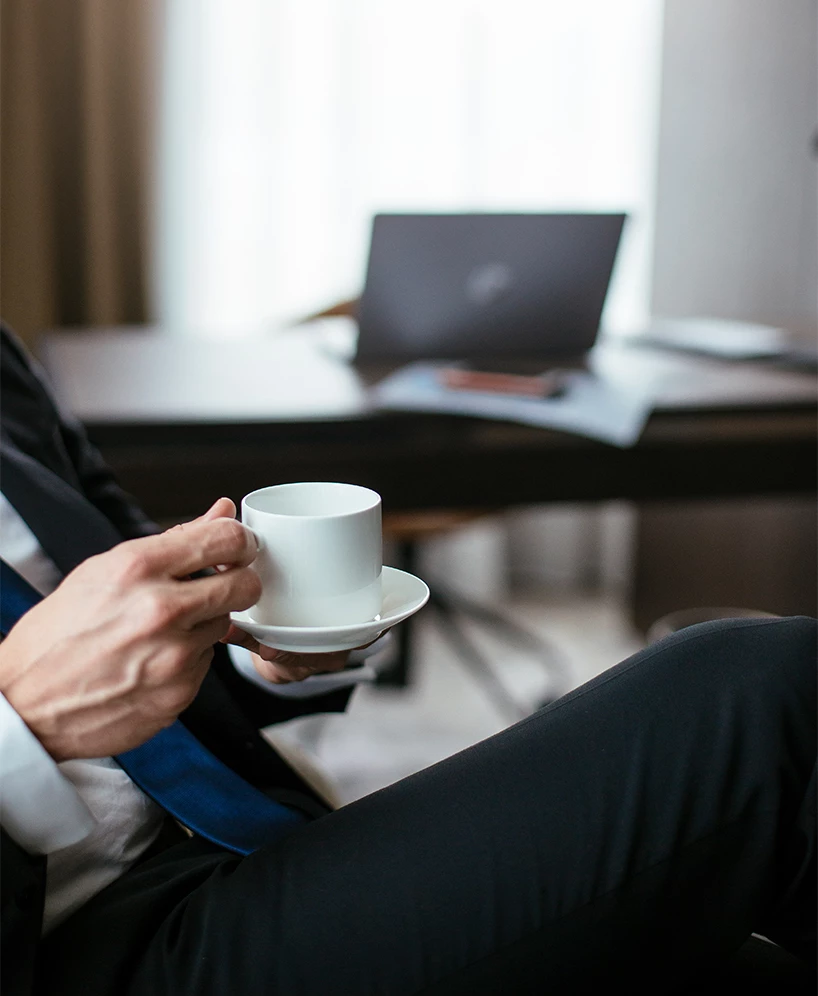 a person holding a cup
