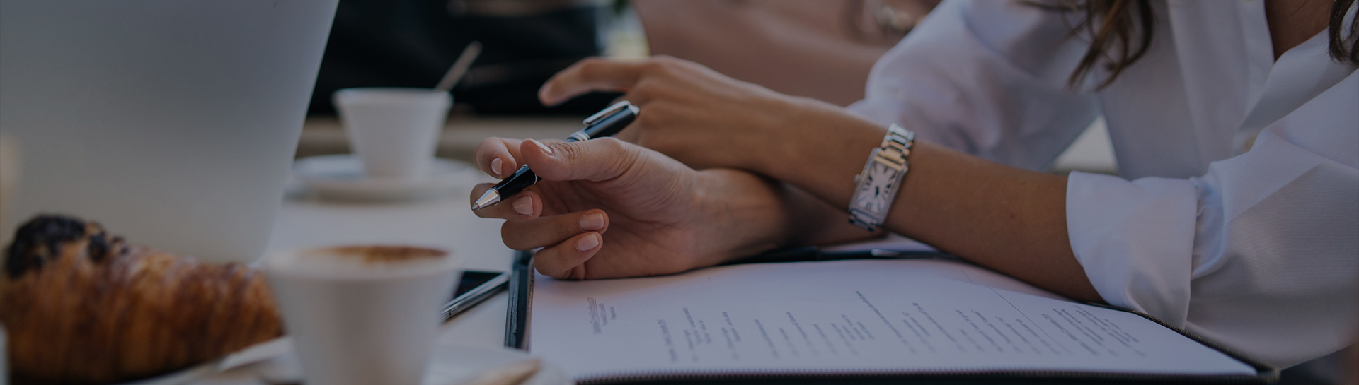 a person holding a pen