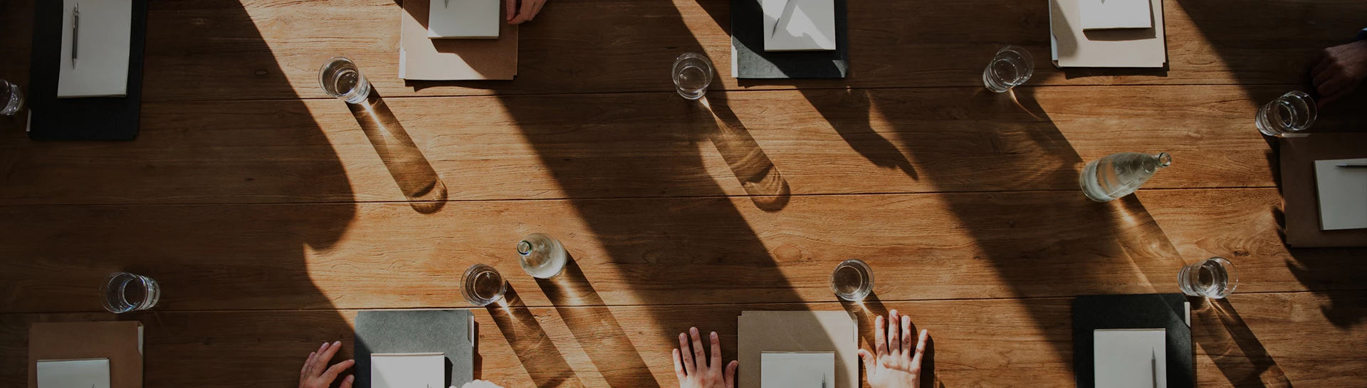 a conference table with a few objects on it