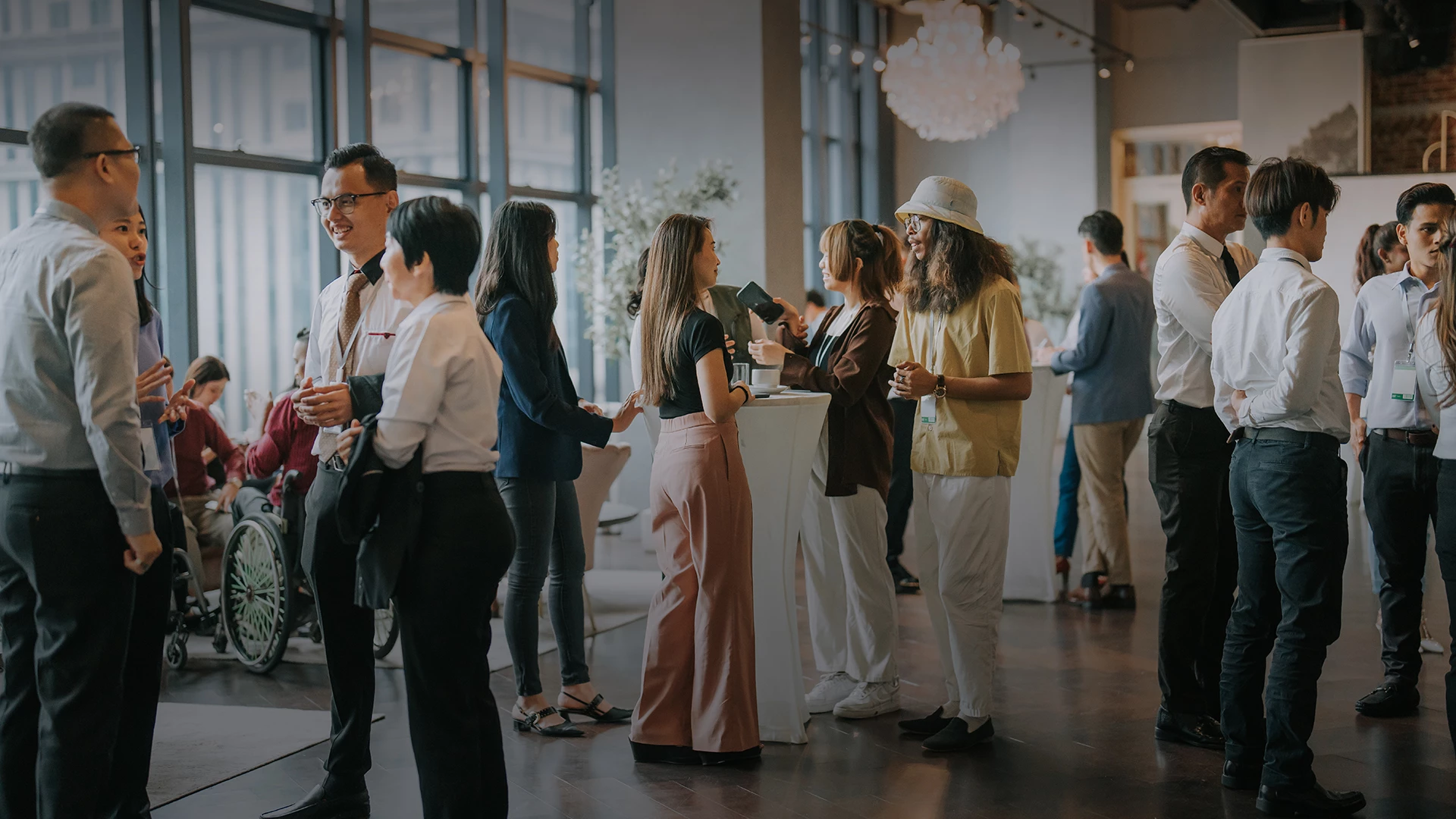 a group of people standing in a room