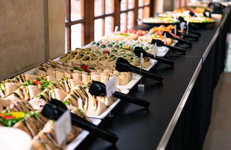 a row of sandwiches on a table