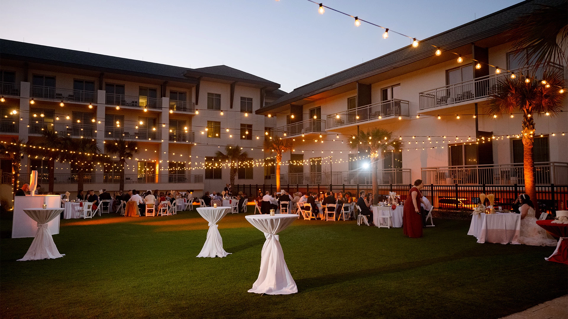 a group of people outside a building